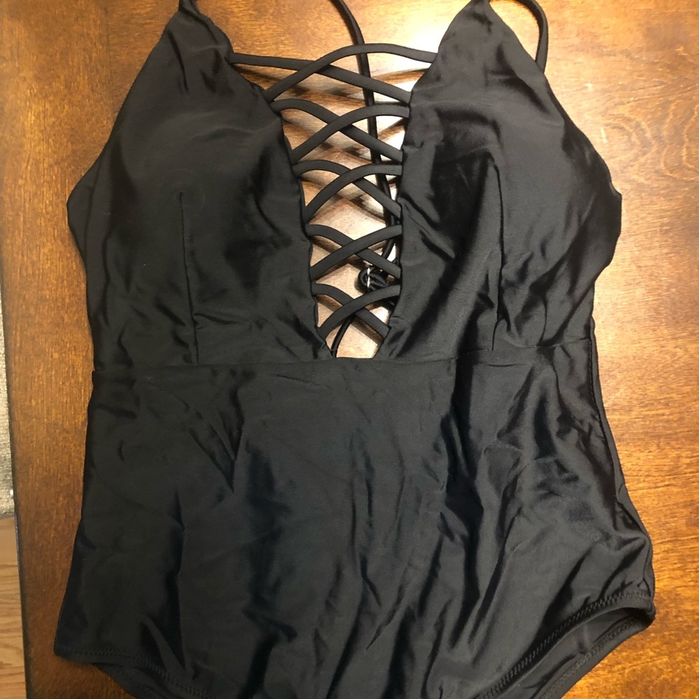 NWT women’s medium black one piece bathing suit